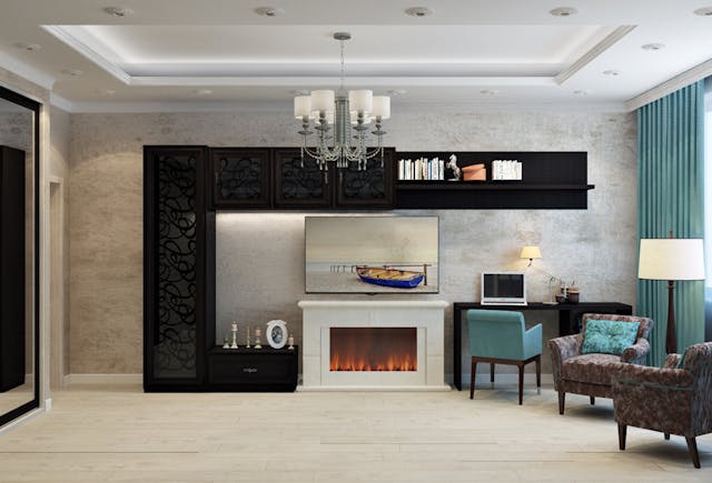 living room with a fireplace chairs and a chandelier